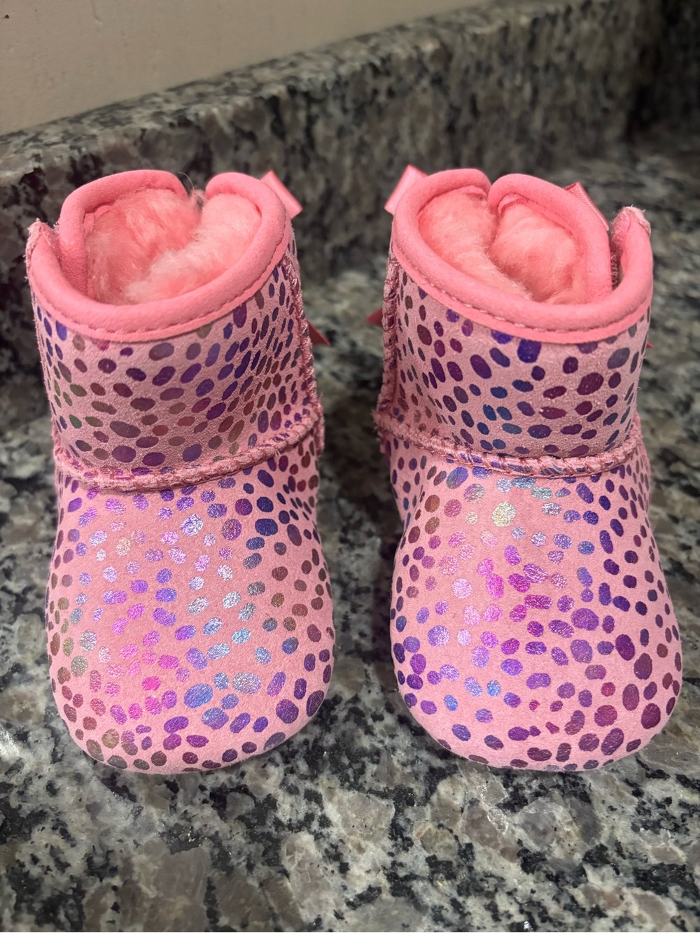 UGG Jesse Bow Metallic Rainbow Polka Dot Baby Bootie in Pink Rose Suede Plush